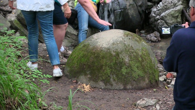 hand-on-stone-sphere-img_0995